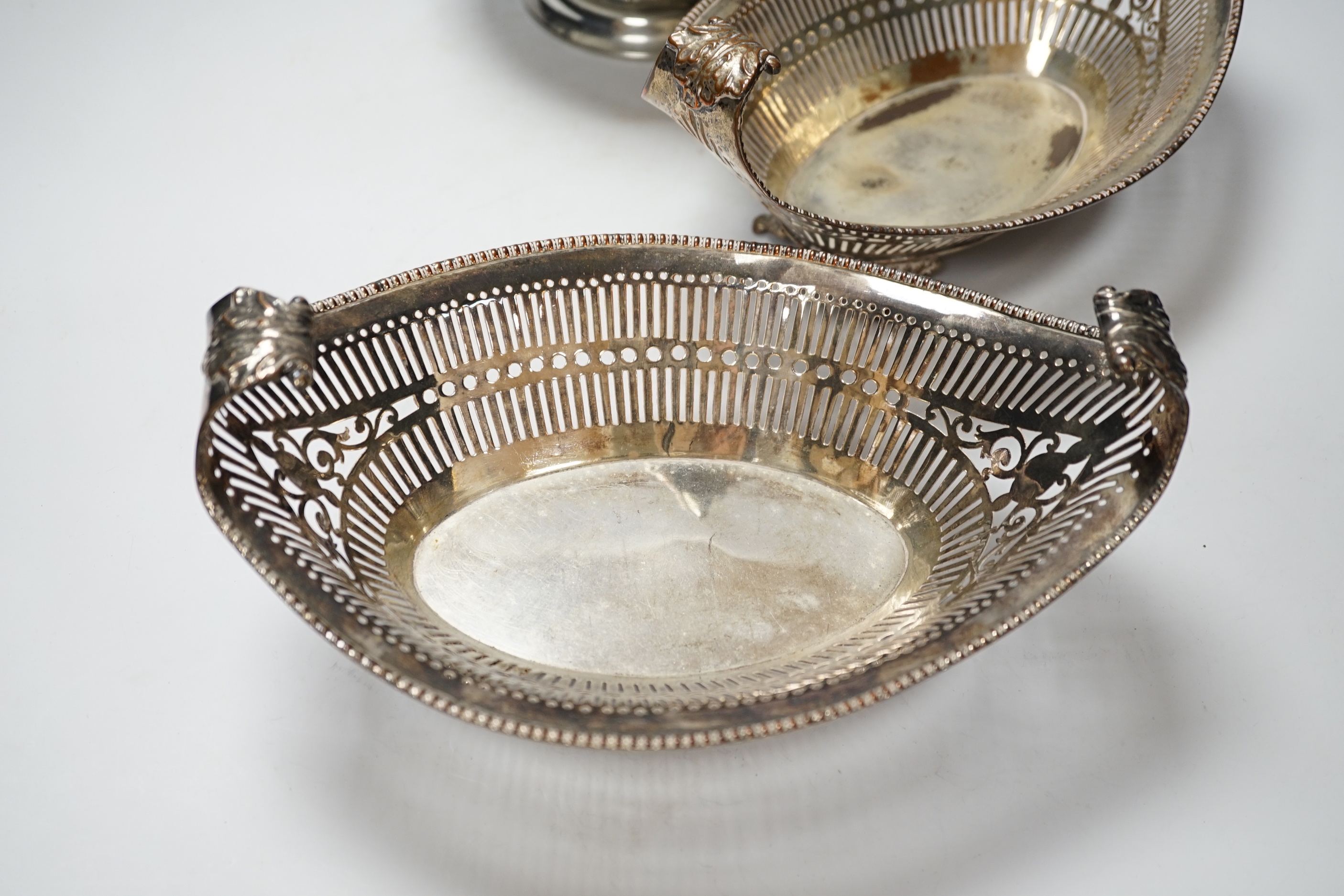 A pair of late 19th/early 20th century pierced plated oval dishes and plated jardiniere, dishes 25cm long